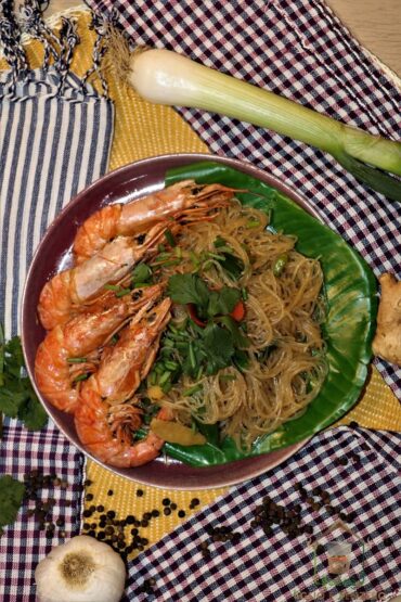 Un piatto di spaghetto allo zenzero con gamberi